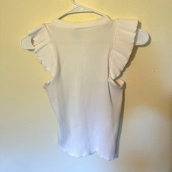 a cute white, ruffly top - Picture 2 of 2